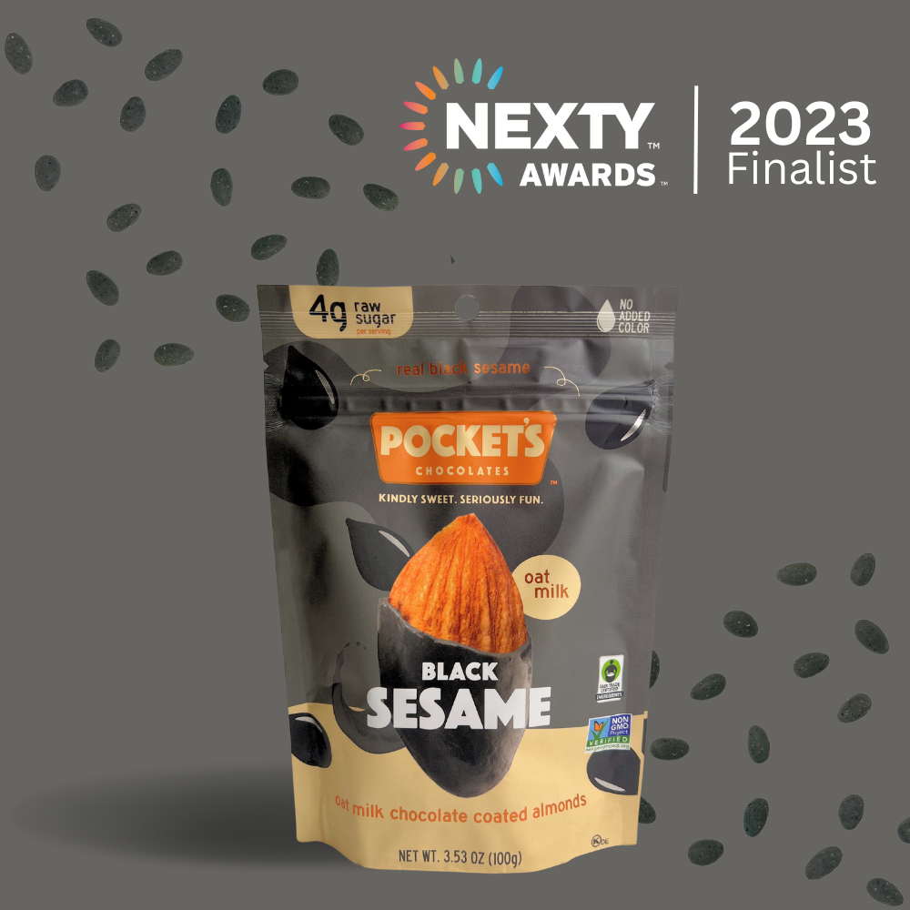Pockets Chocolate Black Sesame flavor with oat milk chocolate coated almonds and 2023 Nexty Awards finalist badge