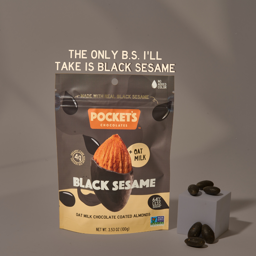 Pocket's Chocolates' Black Sesame chocolate almonds with text that reads "The only B.S. I'll take is black sesame"